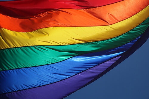 An openly gay Texas judge was recently forced to remove a rainbow flag from her courtroom after a local defense attorney complained about bias.