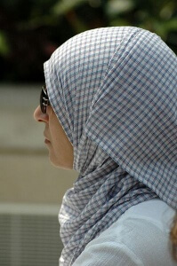 A muslim woman wearing a hijab. 