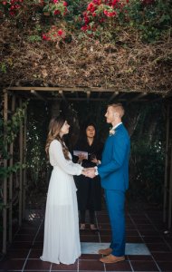 A wedding couple exchanging vows at the ceremony