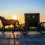 The Amish community is suing the state of Ohio over its new requirement that they install yellow flashing lights on their buggies.