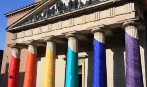 Courthouse draped in LGBTQ rainbow.