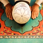 Muslim praying in Islamic fashion
